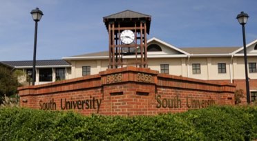 South University sign with clock tower