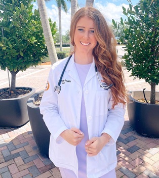 Physician Assistant Mackenzie Doughty in her whitecoat