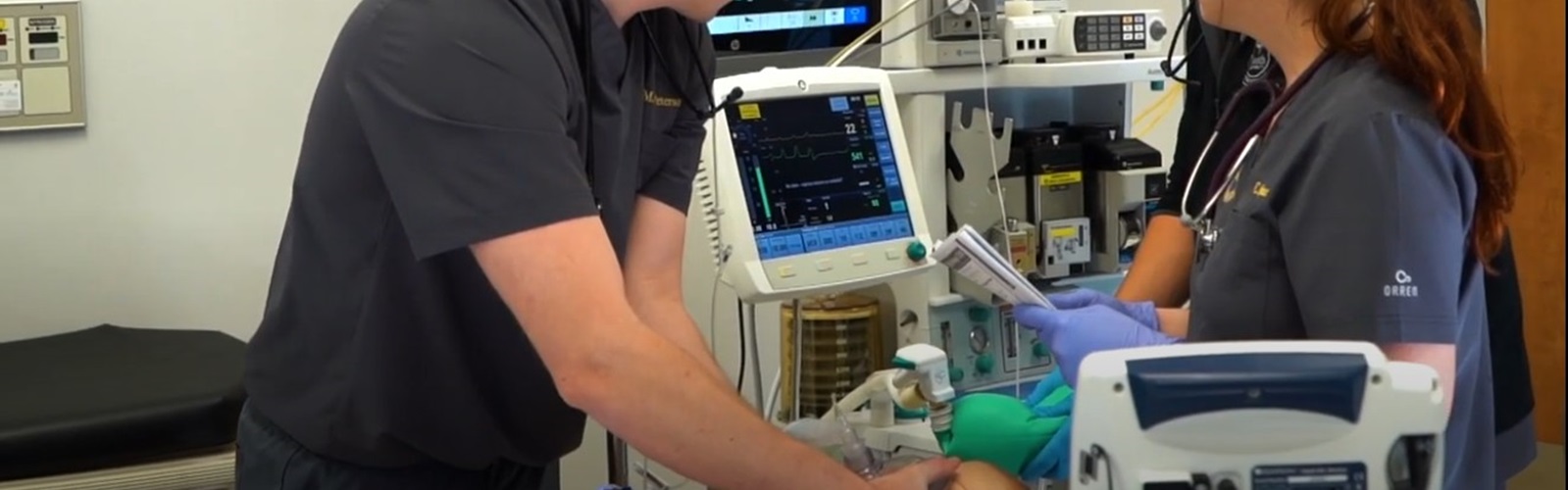 three anesthesia science students in the South University simulation lab