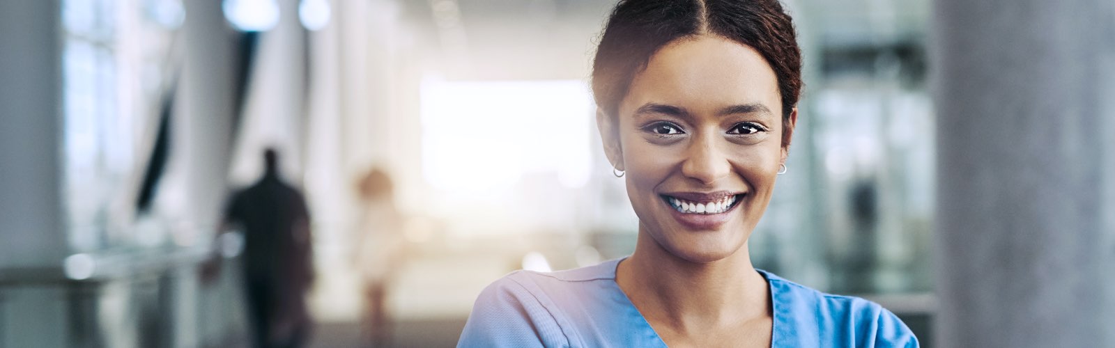 Female nurse in hospital hallway