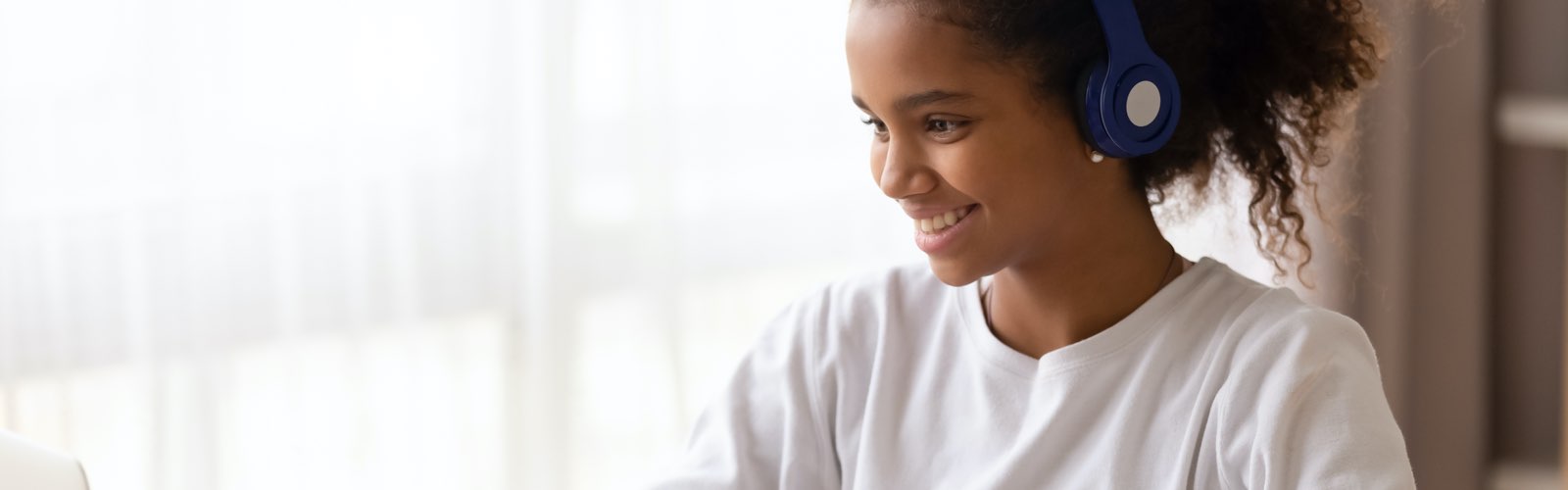 Female student studying on laptop